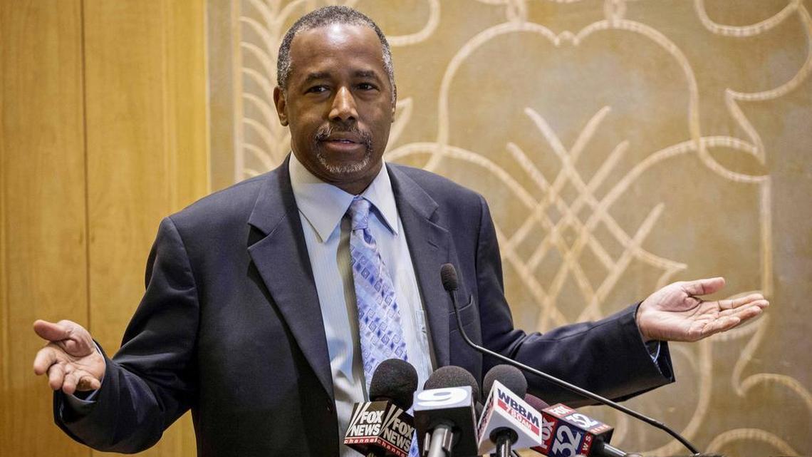 Republican presidential candidate Ben Carson takes questions from reporters Thursday, Dec. 10, 2015, at the Peninsula Hotel in Chicago after a roundtable meeting with pastors.