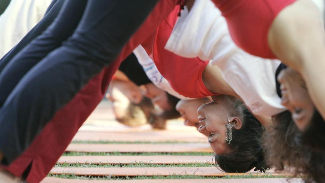 The author says in her book that there are dangers to combining yoga and marijuana, although she's most worried about overstretching, which can happen in any yoga class.