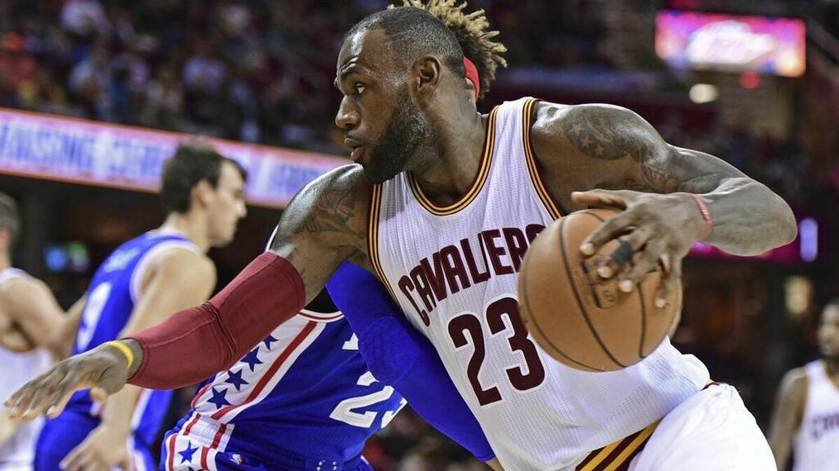 Cleveland Cavaliers forward LeBron James tidied up after his teammates Saturday night, following a preseason win over the Philadelphia 76ers.