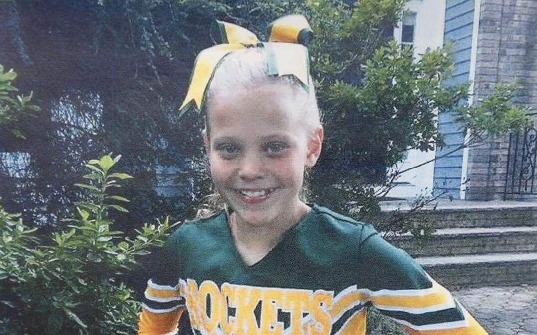 In this undated photo provided by Dianne Grossman, her daughter Mallory Grossman poses for a picture. The New Jersey mother is suing her late daughter's school district because she said they didn't do enough to stop cyber bullying against her daughter that led the 12-year-old to kill herself.
