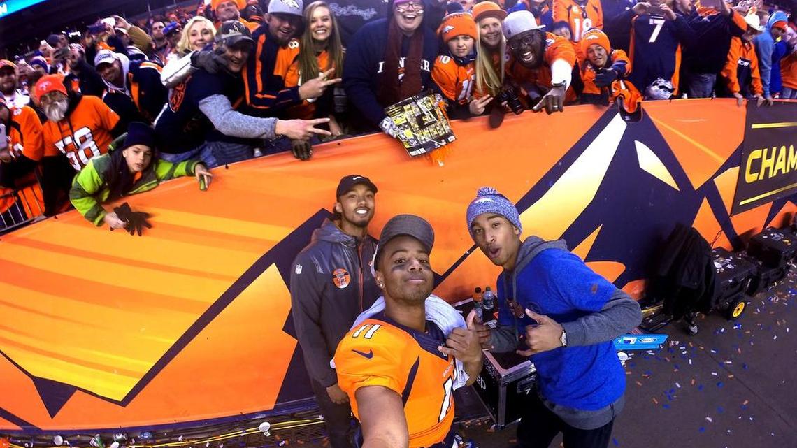 Denver Broncos wide receiver Jordan Norwood poses with his brothers Levi, left, and Zac, right, after the AFC Championship game on Jan. 24.