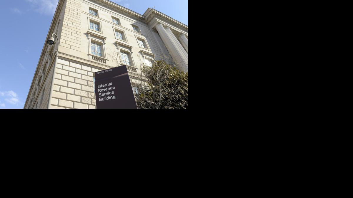 
This March 22, 2013, file photo, shows exterior of the Internal Revenue Service building in Washington. New data show that cash-strapped Americans anxious for tax refunds are increasingly turning to payment advances and prepaid cards when getting tax preparation help. 

