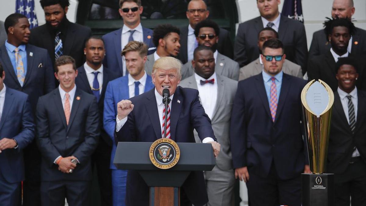 President Donald Trump speaks on the South Lawn of the White House in Washington, Monday, June 12, 2017, during a ceremony to welcome the 2016 NCAA Football National Champions Clemson University Tigers.