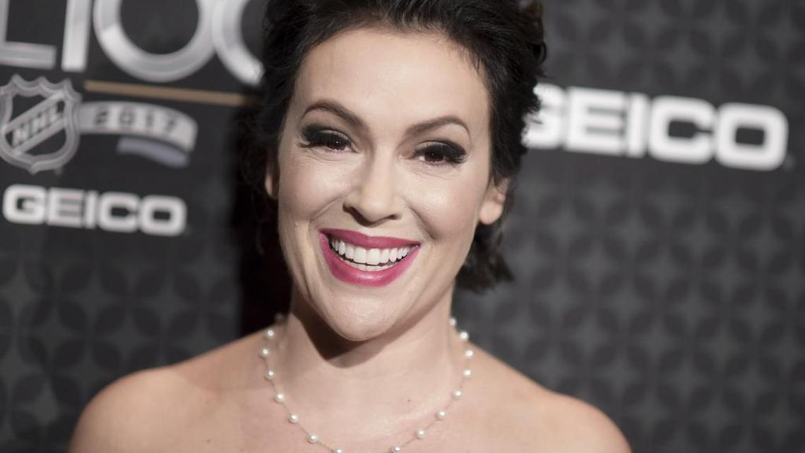 Alyssa Milano arrives at the The NHL100 Gala held at the Microsoft Theater on Friday, Jan. 27, 2017, in Los Angeles.