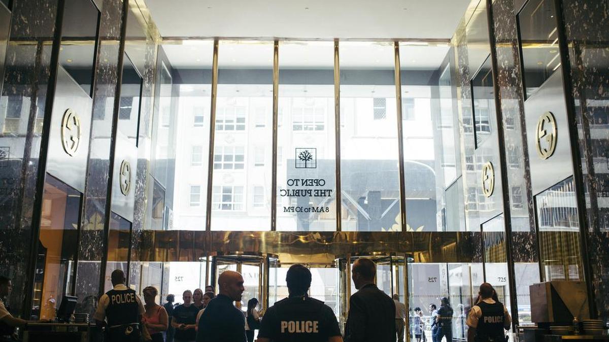 Police officers keep watch at Trump Tower in Manhattan, New York, on Thursday.
