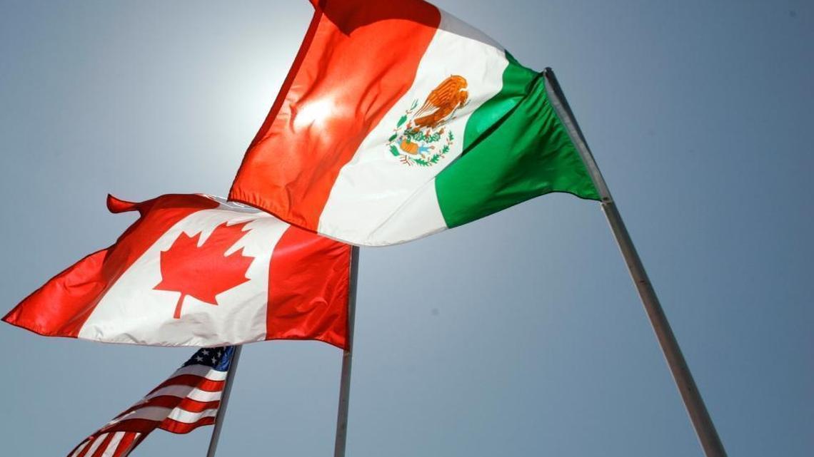 The flags of the United States, Canada, and Mexico flying in New Orleans where leaders of the North American Free Trade Agreement met. Mexico, the United States and Canada began a second round of talks in early September on re-negotiating the pact.