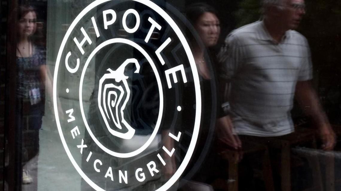This September 9, 2015 file photo shows a Chipotle restaurant sign in New York. Burrito giant Chipotle Mexican Grill, which has surged on growing consumer interest in natural ingredients, revealed details Friday of an April hack to its point-of-sale system computers.