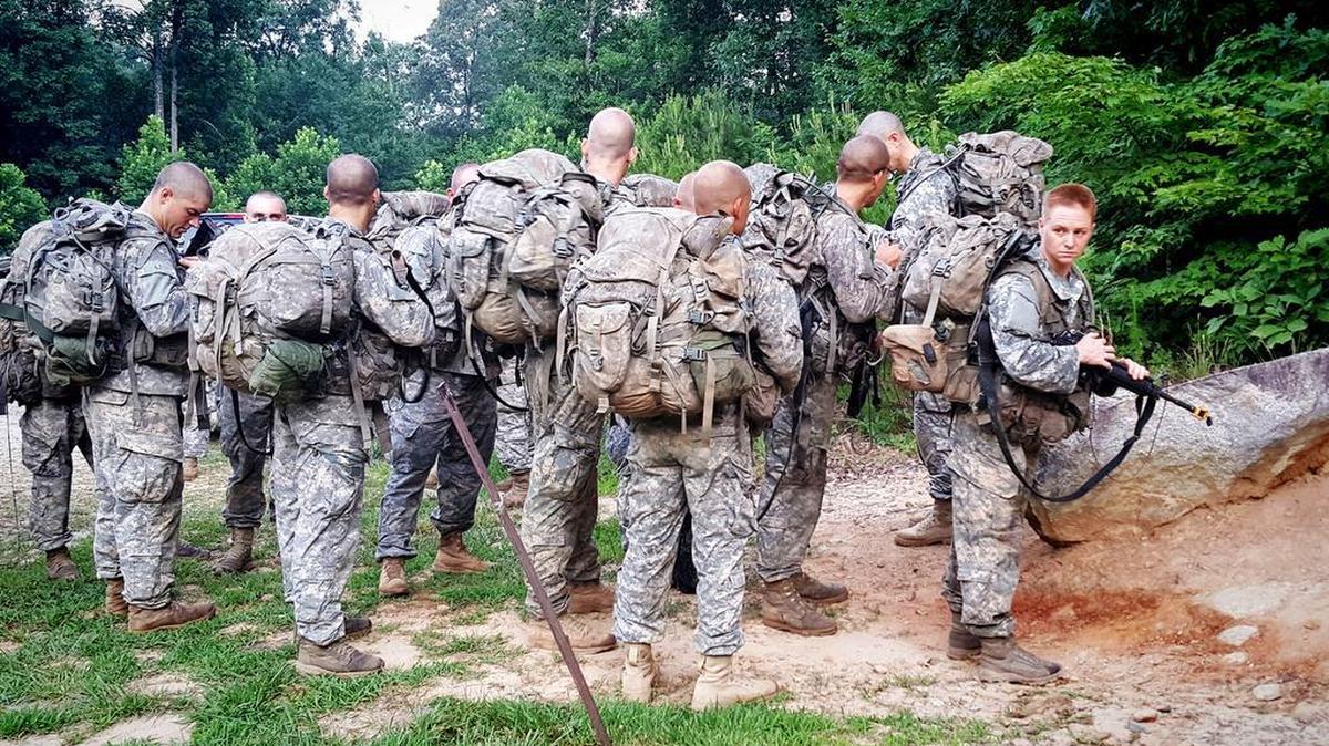 
Ranger students, including one of the first women ever to take the Ranger School course, wait to ascend Mount Yonah in Georgia as part of the schools Mountain Phase. 
