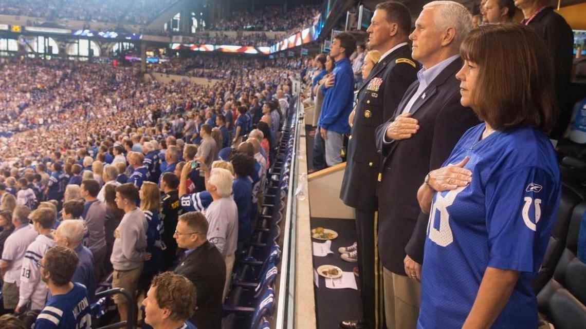 Vice President Mike Pence and his wife, Karen, stood for the national anthem at the NFL game Sunday in Indianapolis. Pence left when several 49ers knelt during the anthem. President Donald Trump had asked him to.