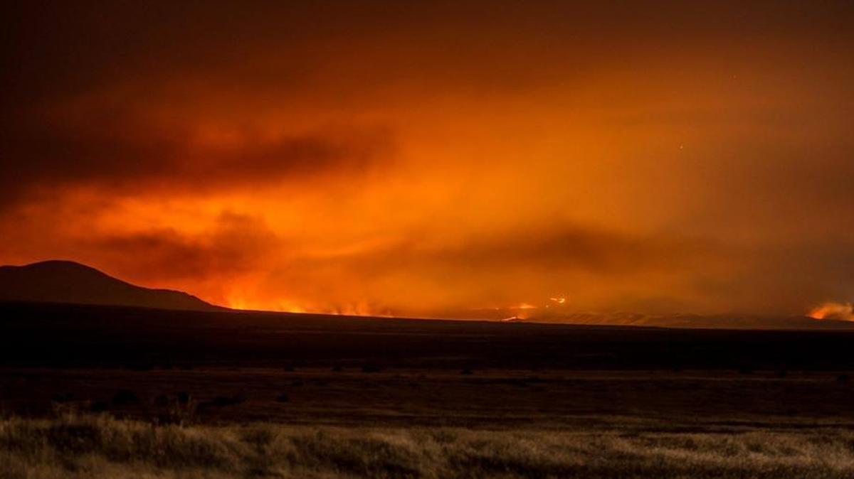 The Range 12 Fire advanced Sunday night toward the north end of the Arid Lands Ecology Reserve, which is part of the security perimeter around the Hanford nuclear reservation west of Highway 240.