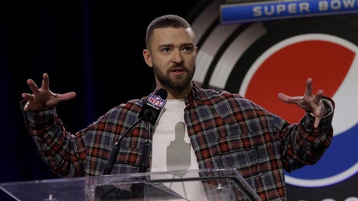 Justin Timberlake answers questions during a news conference for the NFL Super Bowl 52 football game halftime show Thursday, Feb. 1, 2018, in Minneapolis.