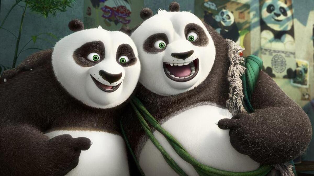 Characters Po, voiced by Jack Black, left, and his long-lost panda father Li, voiced by Bryan Cranston, bond in a scene from “Kung Fu Panda 3.”