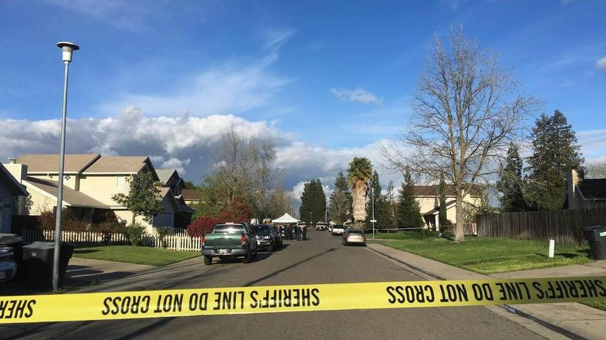Homicide detectives and other officials gathered in south Sacramento County where a 2-year-old reportedly shot herself March 8, 2016.