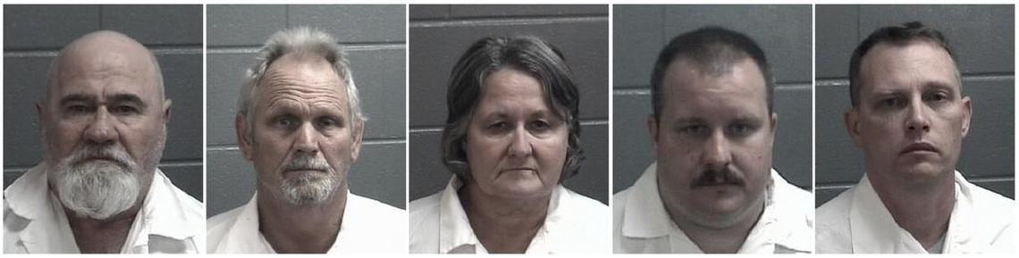 This combination of undated booking photos released by the Spalding County, Georgia, Sheriff's Department shows, from left, Frankie Gebhardt, Bill Moore Sr., Sandra Bunn, Lamar Bunn and Gregory Huffman, all charged in connection with the death of Timothy Coggins, a black man killed in Georgia in 1983. In October 2017, authorities charged Gebhardt and Moore with murder in the slaying of Coggins. Sandra and Lamar Bunn and Huffman have been charged with obstruction in the case. A prosecutor in the case said Coggins was killed because he had been “socializing with a white female.”