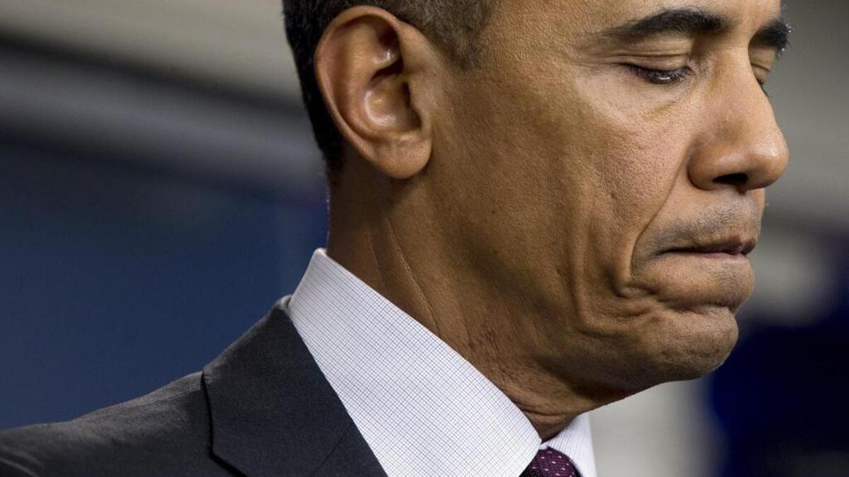 
President Barack Obama pauses as he speaks in the Brady Press Briefing Room at the White House in Washington, Oct. 1, 2015, about the shooting at the community college in Oregon. 
