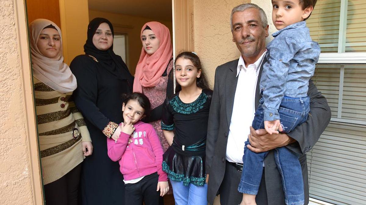 
The Al Jawabra family is pictured Oct. 16, 2015, at their Modesto, Calif., home. From left are Alaa, Nadin, Hala, Noor, Aya, Abdulhamid and Ali.
