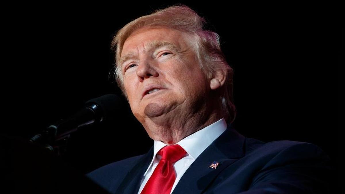 FILE - In this Dec. 16, 2016 file photo, President-elect Donald Trump speaks during a rally in Orlando, Fla. 