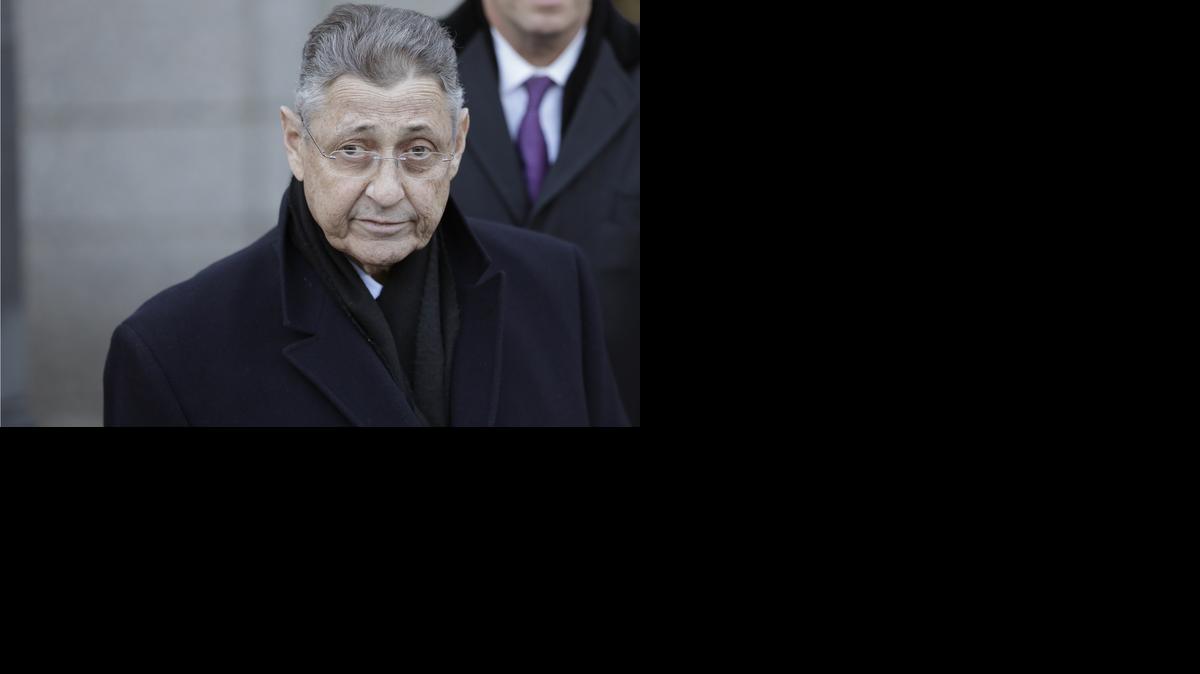 
New York Assembly Speaker Sheldon Silver speaks to reporters as he leaves a federal courthouse in New York, Thursday, Jan. 22, 2015. Silver, 70, was arrested Thursday on public corruption charges and accused of using his position to obtain millions of dollars in bribes and kickbacks masked as legitimate income. A magistrate judge in federal court in Manhattan later released the lawmaker on $200,000 bail. 
