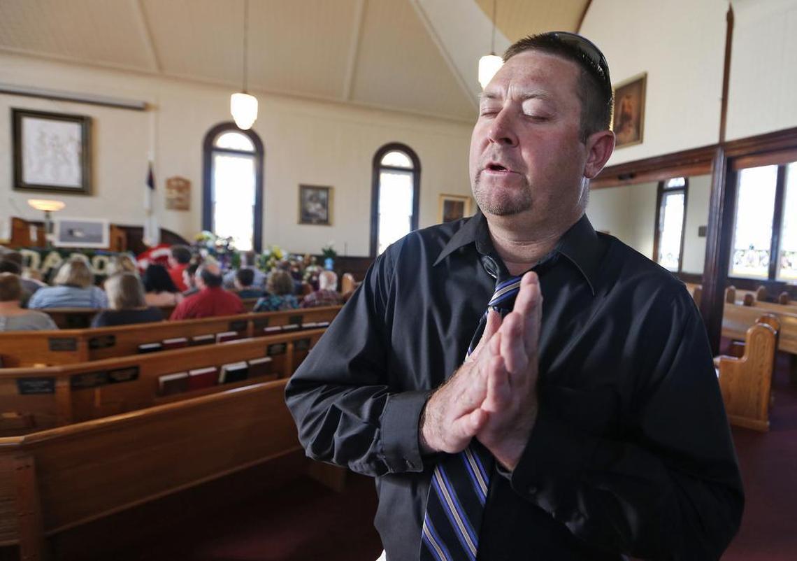 Jason Charnock talks about his father during a memorial service on Wednesday May 17, 2017, at a church in Tangier, Va. Tangier Island is continuing to work through the loss of one of its watermen. Ed Charnock drowned after his crabbing boat sank in late April. Jason Charnock was rescued after treading water alone for an hour.