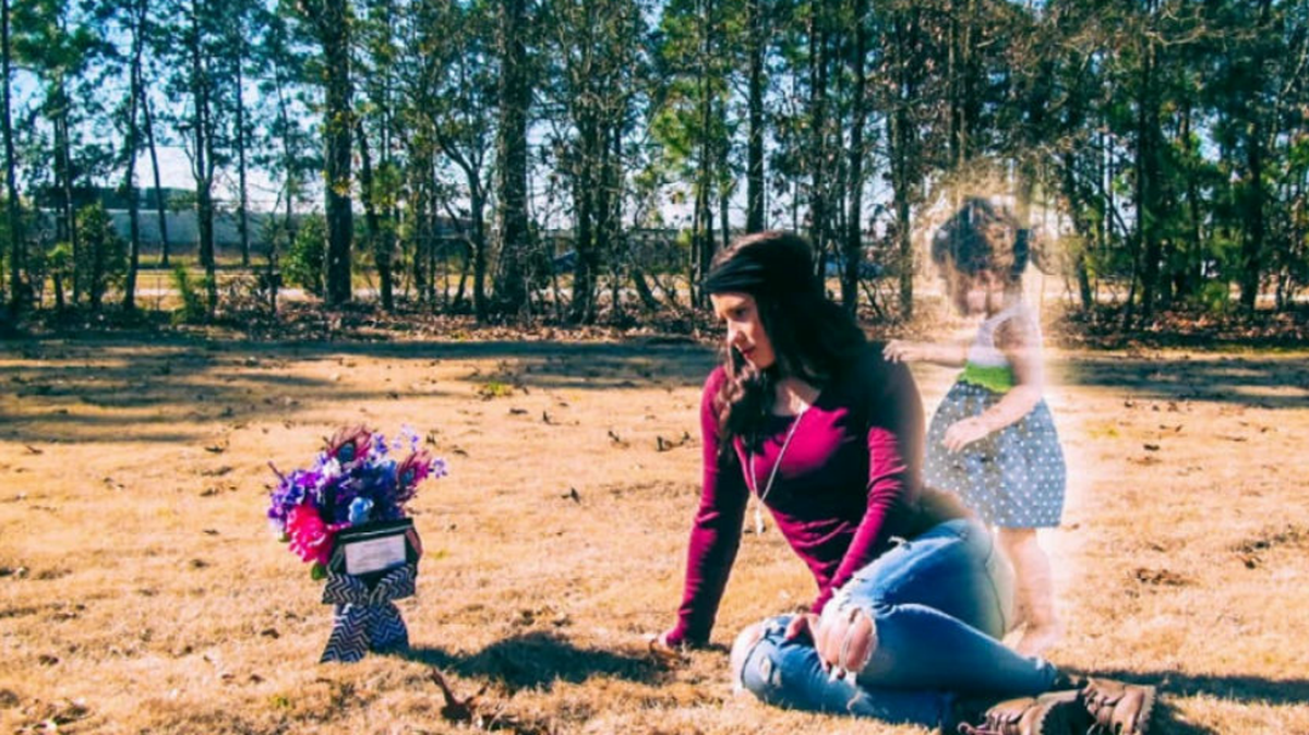 Photographer Sunny Jo says he created this photo of Jeanie Ditty, with an image of her deceased 2-year-old daughter, Macy, superimposed because Sunny Jo said she wanted him to create the last picture she would ever have with her child. He says he now suspects she was trying to cover up that she had killed her daughter.