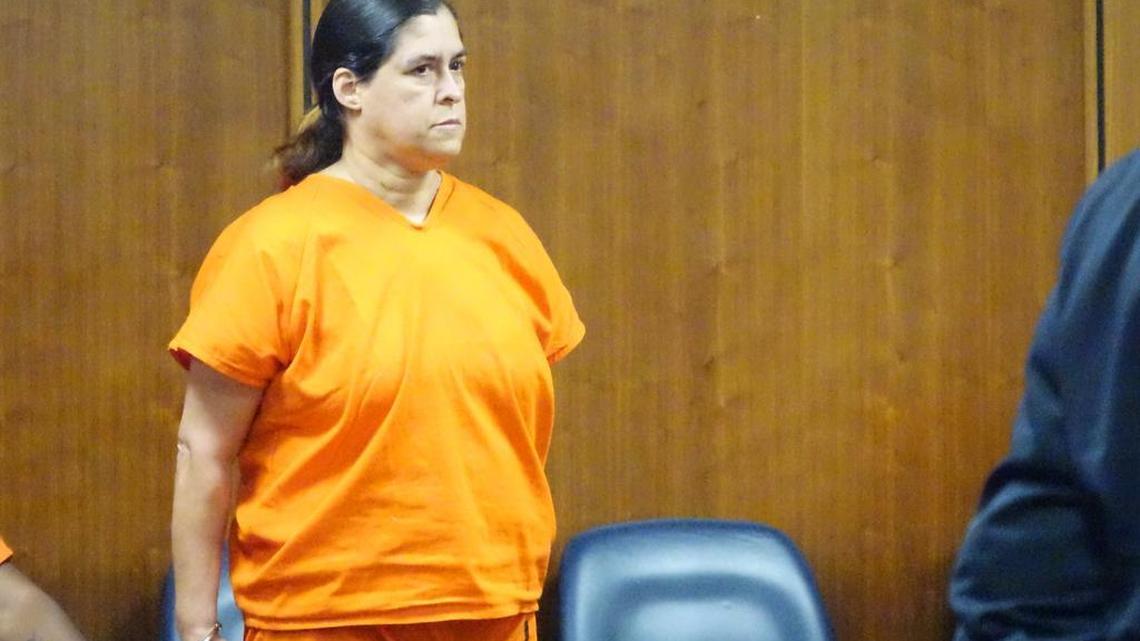 Maria Cabrera Gonzalez in court Friday after Miami-Dade prosecutors charged her with impersonating a law enforcement officer and grand theft.