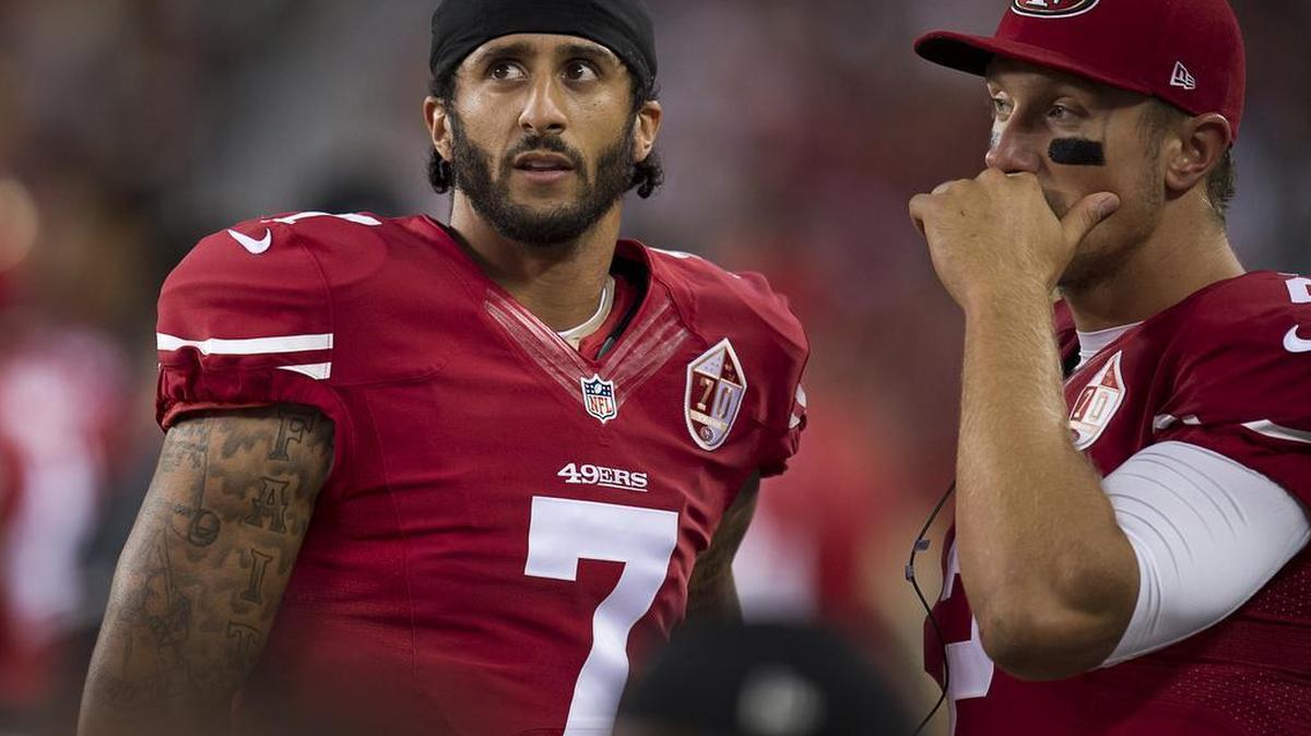 San Francisco 49ers quarterback Colin Kaepernick (7) and San Francisco 49ers quarterback Blaine Gabbert (2) talk after turnover in the second quarter during a preseason game at Levi's Stadium on Friday August 26, 2016 in Santa Clara, Calif