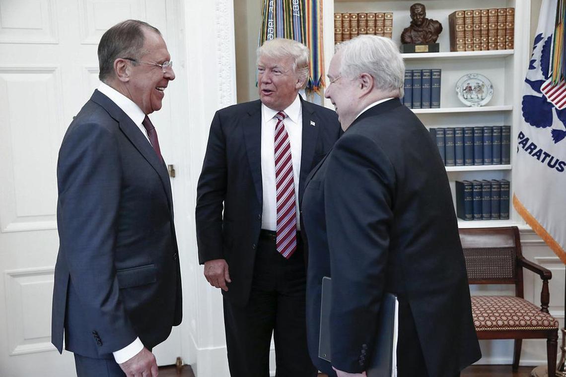U.S. President Donald Trump meets with Russian Foreign Minister Sergey Lavrov, left, next to Russian Ambassador to the U.S. Sergei Kislyak at the White House in Washington, Wednesday, May 10, 2017. Trump on Wednesday welcomed Vladimir Putin's top diplomat to the White House for Trump's highest level face-to-face contact with a Russian government official since he took office in January.
