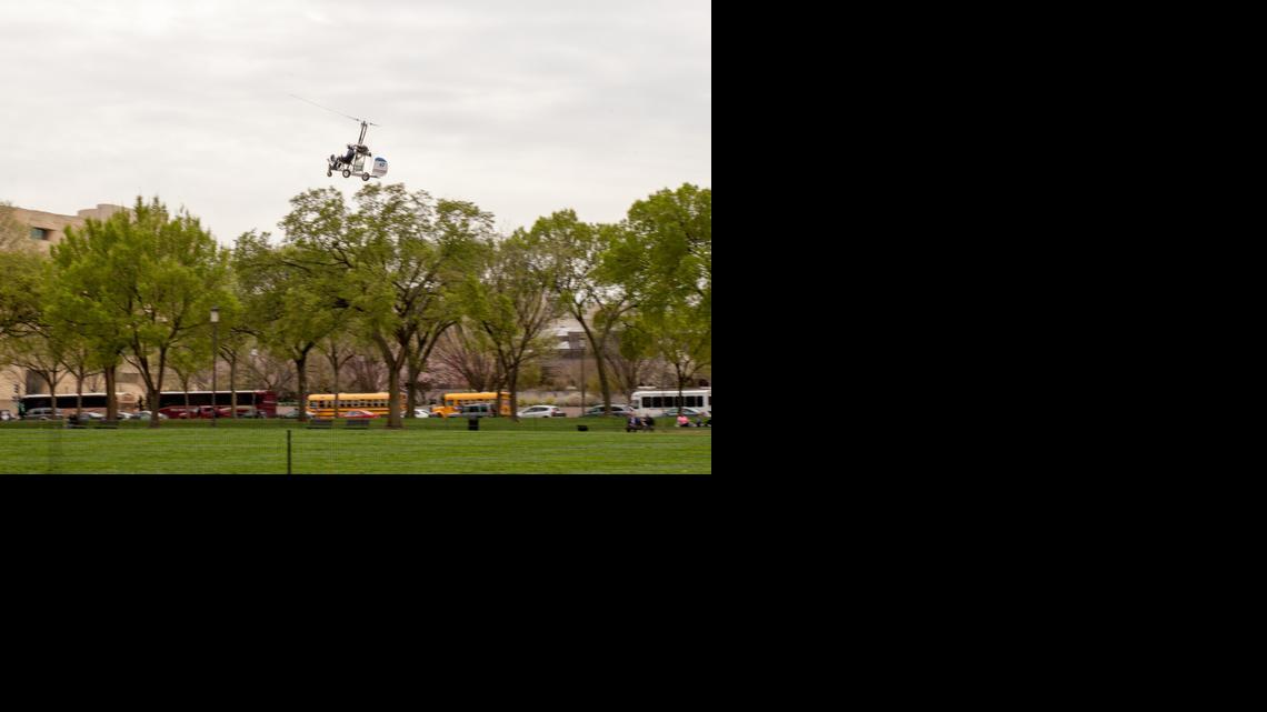 
A small helicopter lands on the West Lawn of the Capitol in Washington, Wednesday, April 15, 2015. Police arrested the pilot. 
