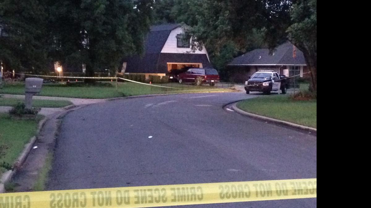 
Crime scene tape marks off the area as police investigate scene, Thursday morning, July 23, 2015, in Broken Arrow, Okla., where authorities say five people were found dead late Wednesday night. Police say a 16-year-old and an 18-year-old, who are both related to the victims, were taken into custody. 
