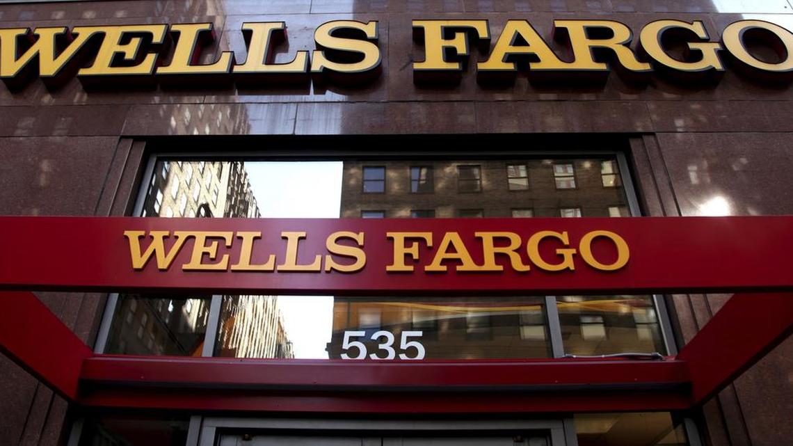 A Wells Fargo sign is displayed at a branch in New York, in this 2012 file photo.