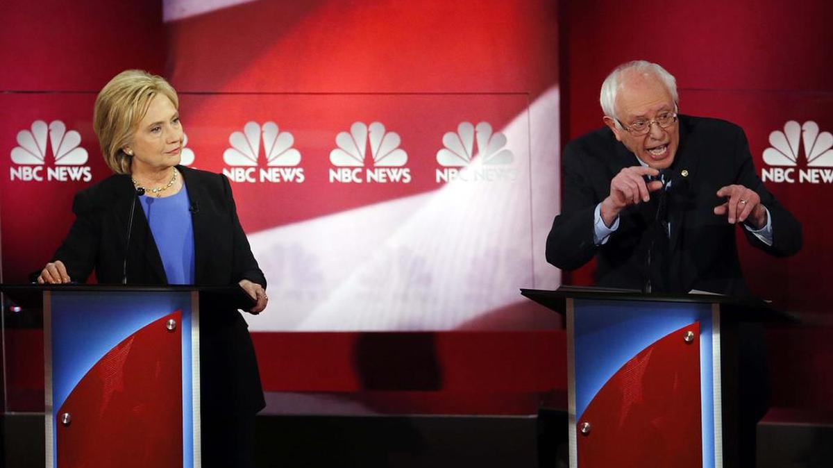 Democratic presidential candidate Sen. Bernie Sanders responds energetically to former Secretary of State Hillary Clinton during the debate Sunday, Jan. 17, 2016.