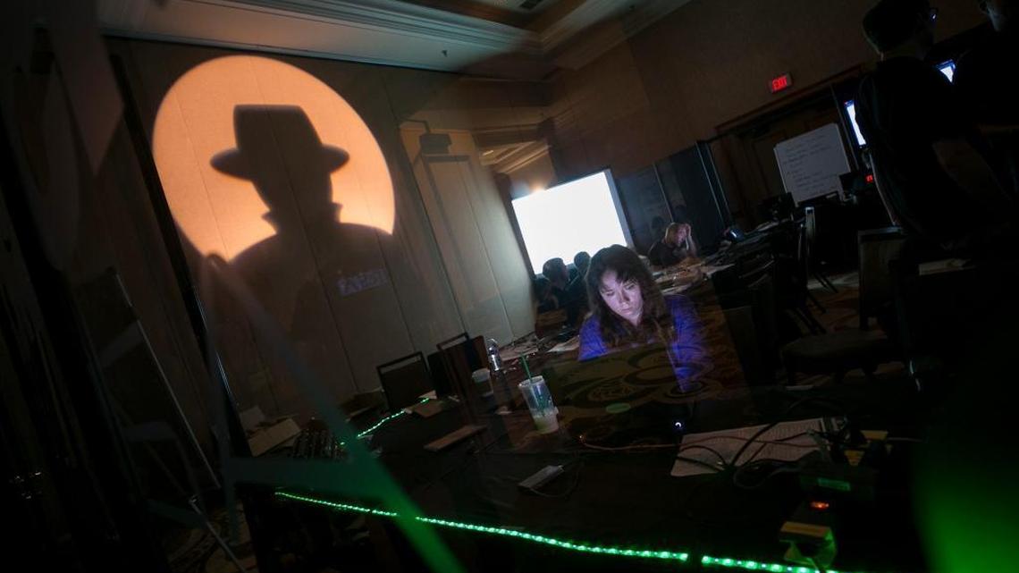 A Black Hat tech associate works in the network operating center during the Black Hat information security conference in Las Vegas July 26, 2017.