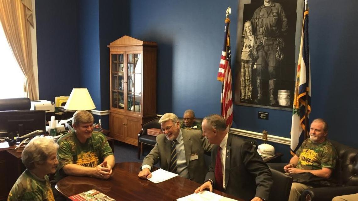 Rep. David McKinley, R-West Virginia, speaks to, from left, Shirley Inman of Madison County, West Virginia, Rick Ryan of Alum Creek, West Virginia and Cecil Roberts, president of the United Mine Workers of America, at McKinley’s Capitol Hill office on March 22, 2017.