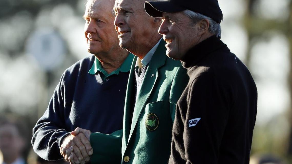 From left, Jack Nicklaus, Arnold Palmer and Gary Player pose during the ceremonial first tee before the first round of the Masters golf tournament Thursday, April 7, 2016, in Augusta, Ga. Golfing legend Arnold Palmer has died at the age of 87.