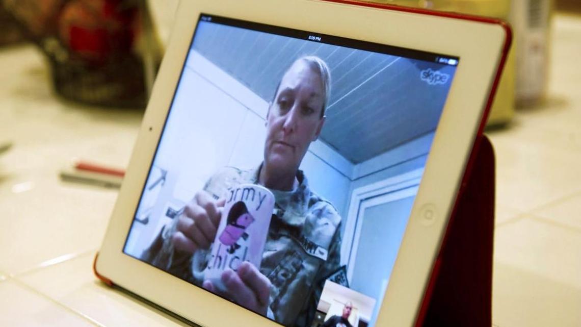 Lori Torres talks with her family in Galt over Skype while having her morning coffee in Afghanistan in 2013. The National Guard demanded that she her husband, Staff Sgt. Troy Torres, repay education expenses they didn’t know were illegally granted. “We have been vilified, like we have done something wrong and must be punished,” Troy Torres said.