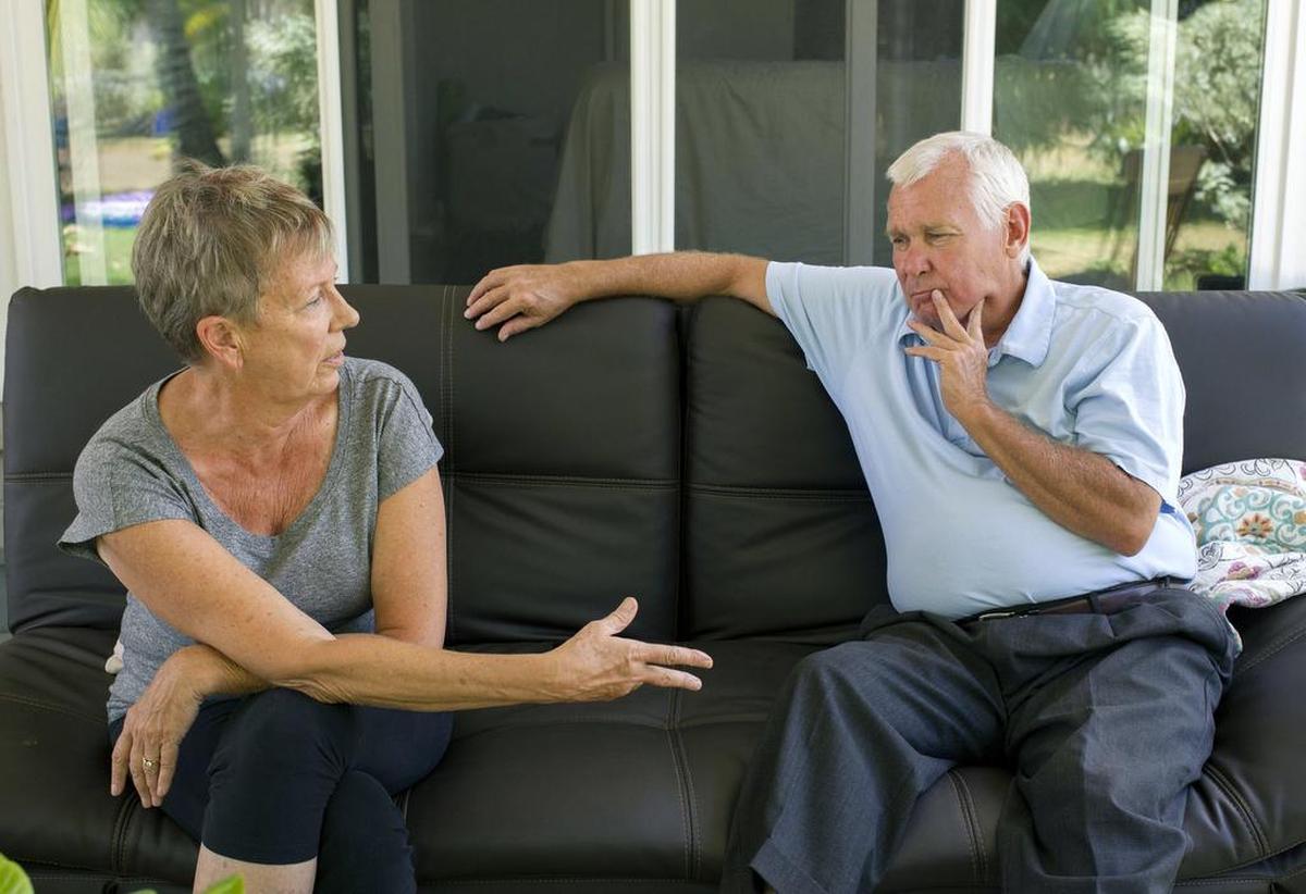 Pearl City Community Church Pastor Phil Reller and his wife, Trina Zelle, remember his brother, Britt Reller, and mother, Melba Jeannine Dilley, who both died in the Marco Polo condominium fire on Friday, July 14, 2017.