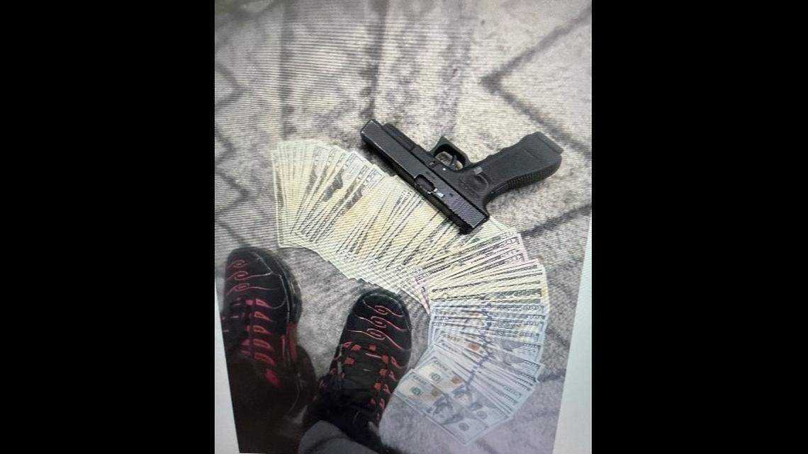 Investigators say they found photos of stolen money on the suspects’ phone.