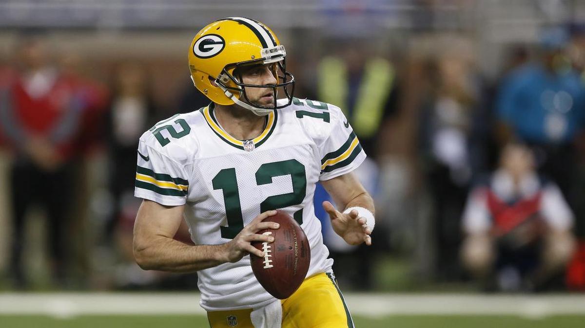 Green Bay Packers quarterback Aaron Rodgers looks to pass the ball against the Detroit Lions during the first half of an NFL football game, Thursday, Dec. 3, 2015, in Detroit.
