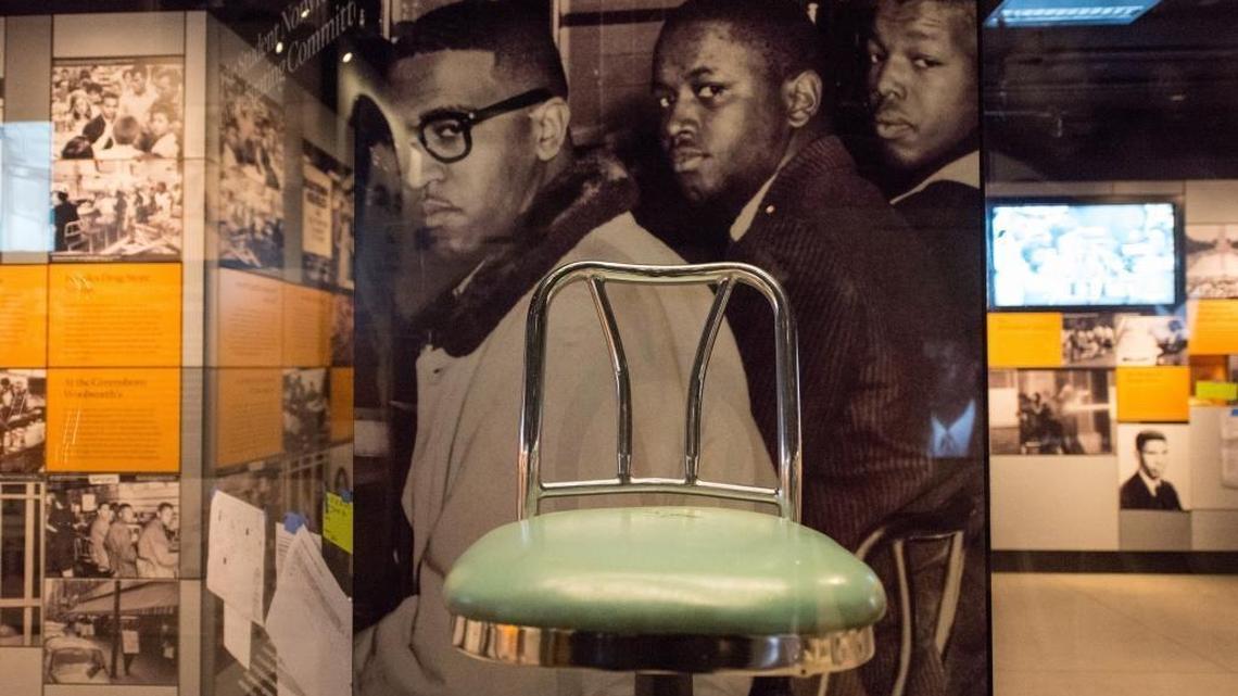 Old Woolworth lunch counter stools from Greensboro, N.C., on exhibit at the Smithsonian's National Museum of African American History and Culture in Washington, D.C., on Sept. 14, 2016. The museum opens Sept. 24.