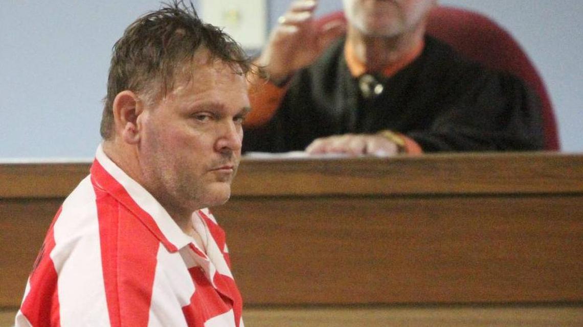 Johnny Max Mount returns to his seat after his initial appearance in front of Judge Albert Fountain in Harrison County court on a charge of first-degree murder in the Friday shooting of Waffle House server Julie Brightwell.