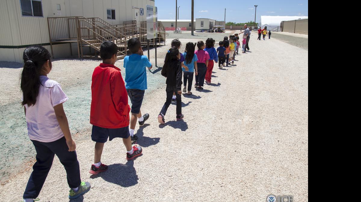 
Children walk to class at the South Texas Family Residential Center in Dilley, Texas.
