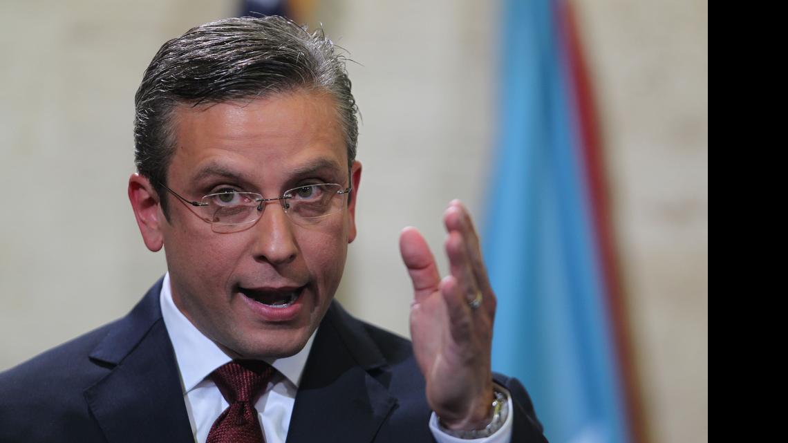 
Puerto Rico Gov. Alejandro García Padilla delivers his budget address for the next fiscal year at the Capitol building in San Juan. Puerto Rico's governor believes the U.S. territory's $72 billion public debt is unpayable, his spokesman confirmed late Sunday, adding another blow to the international financial system already struggling with a possible default by Greece.
