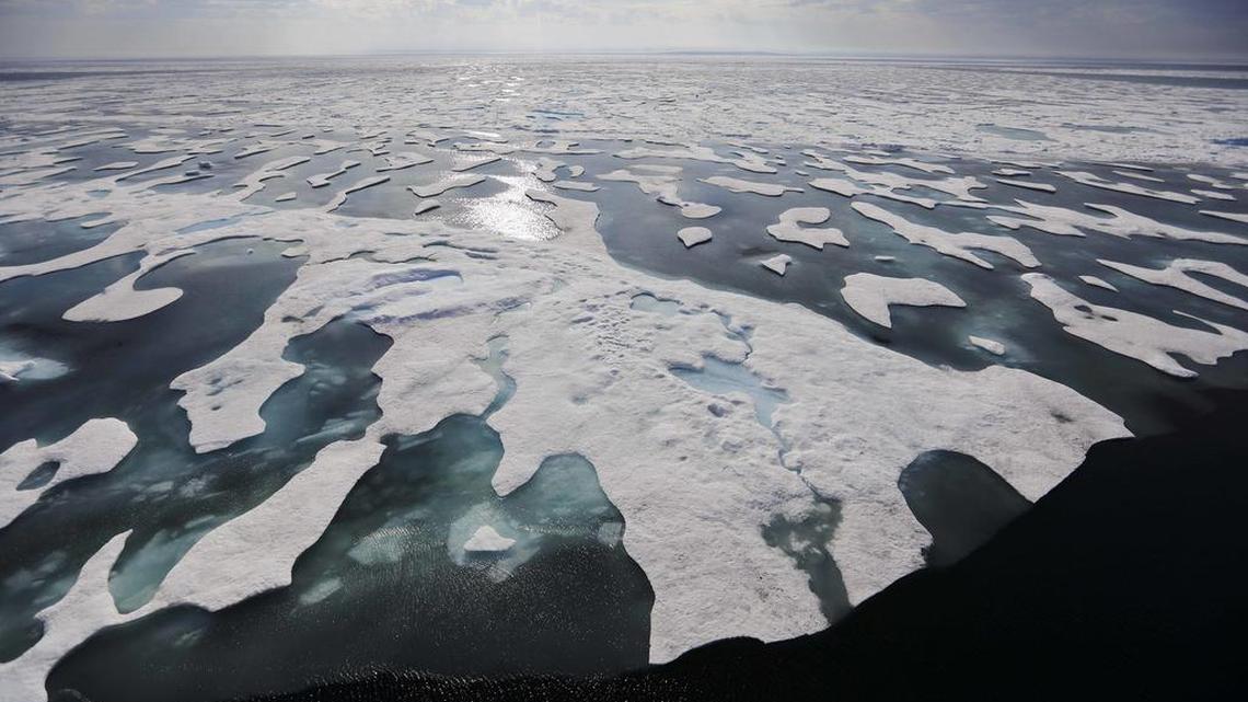Sea ice melts on the Franklin Strait along the Northwest Passage in the Canadian Arctic Archipelago, Saturday, July 22, 2017. Because of climate change, more sea ice is being lost each summer than is being replenished in winters.