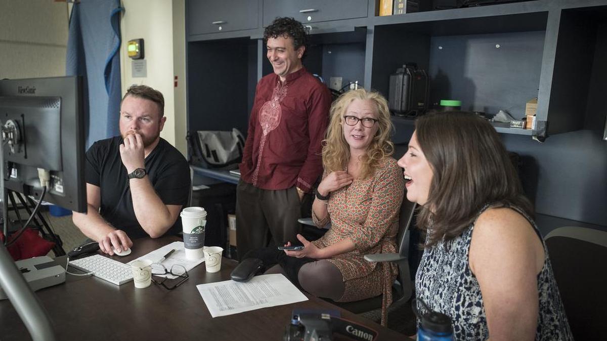 From left, video tech Kyle Van Auker at UC San Francisco, medical school professor Amin Azzam, Tina Brock, Dean of the School of Pharmacy and Jami Mathewson of the Wiki Education Foundation discuss the recording of videos on the integration of Wikipeida pages on medical topics with medical students refinement of the content on the pages. Azzam is teaching a course on the subject.