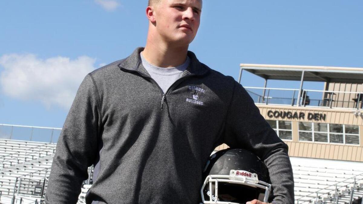 York Comprehensive High School senior Danny Warren played football one day after his father, “Big Dan” Warren died. The teenager tried to resucitate his father after calling 9-1-1 but was unable to revive him.