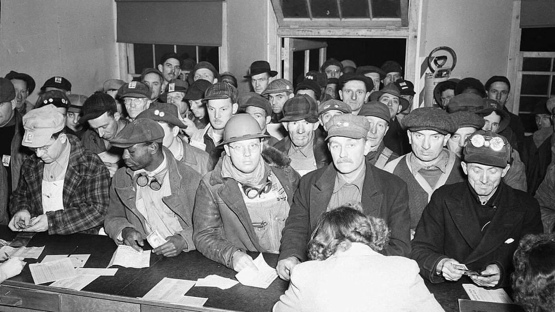 Workers wait in line for paychecks at the Hanford nuclear weapons site, one of the sites that provided the plutonium and uranium for the bombs used at Hiroshima and Nagasaki as part of the Manhattan Project. Hanford had the second-highest number of deaths among workers after the Y-12 National Security Complex in Tennessee.