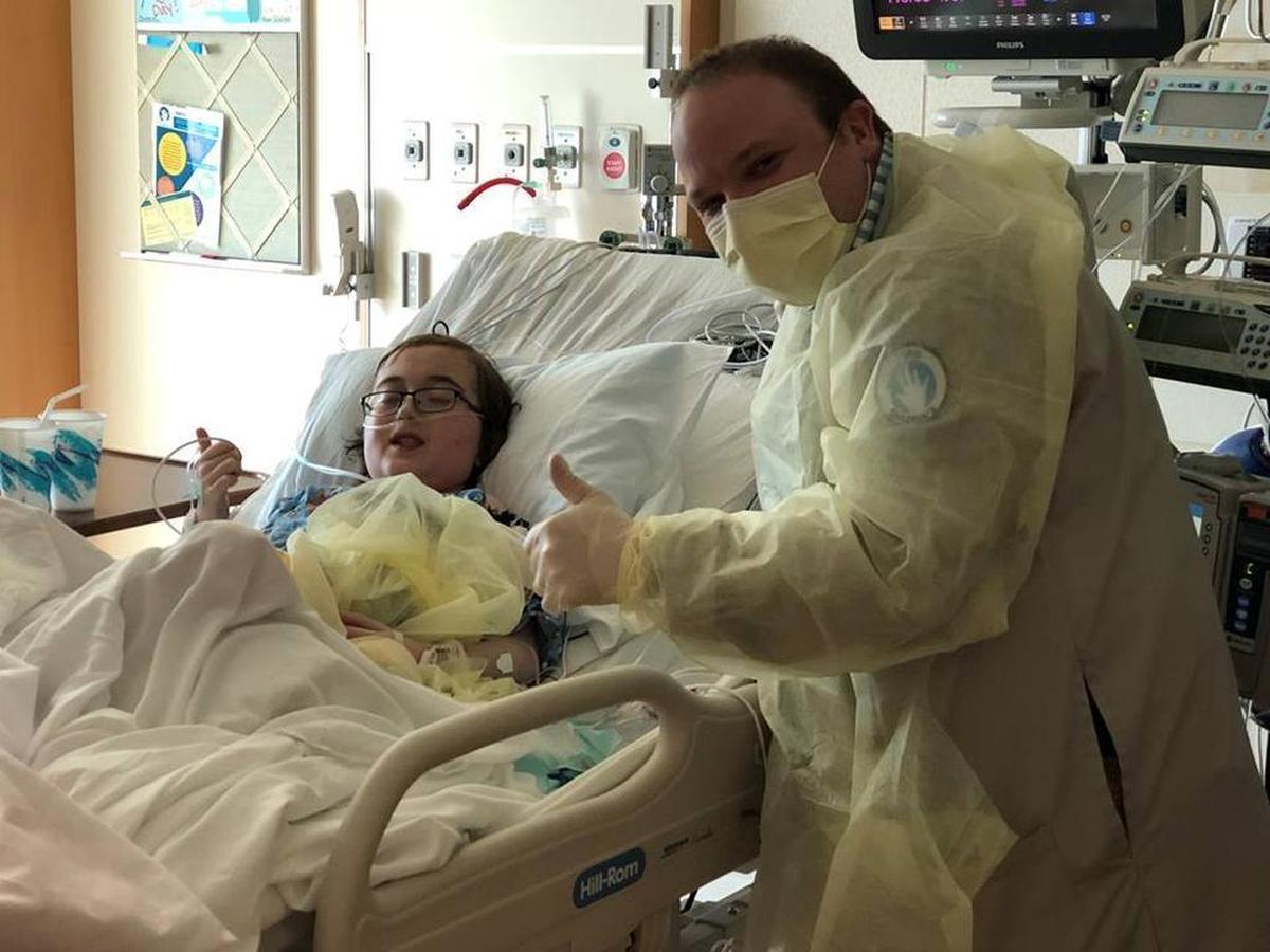 Austin with Dr. Thrush after his transplant.