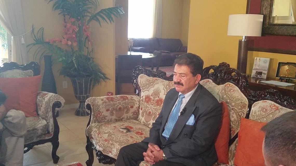 Seddique Mateen prepares to address reporters in his Port St. Lucie home.