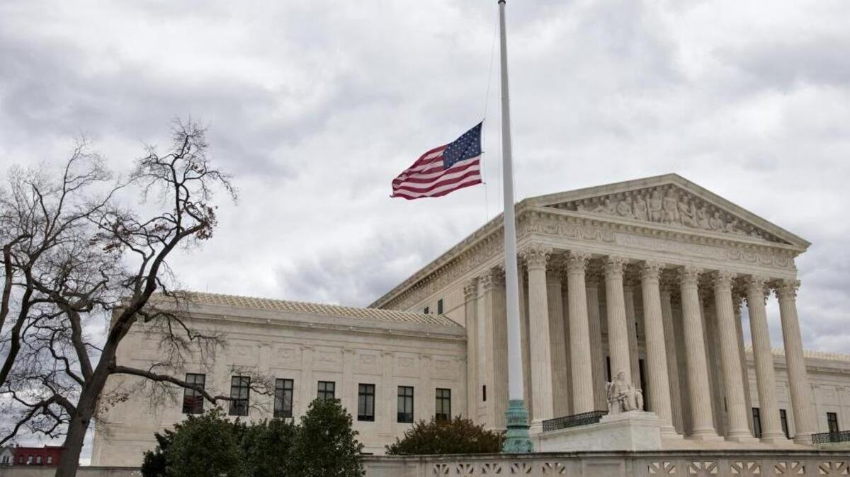 The flag outside the Supreme Court building was flown at half staff in honor of Justice Antonin Scalia after he died last month. On Tuesday, the impact of that death was clear as the court, on a 4-4 tie, upheld a teachers union in a case that conservative groups had hoped would go the other way.