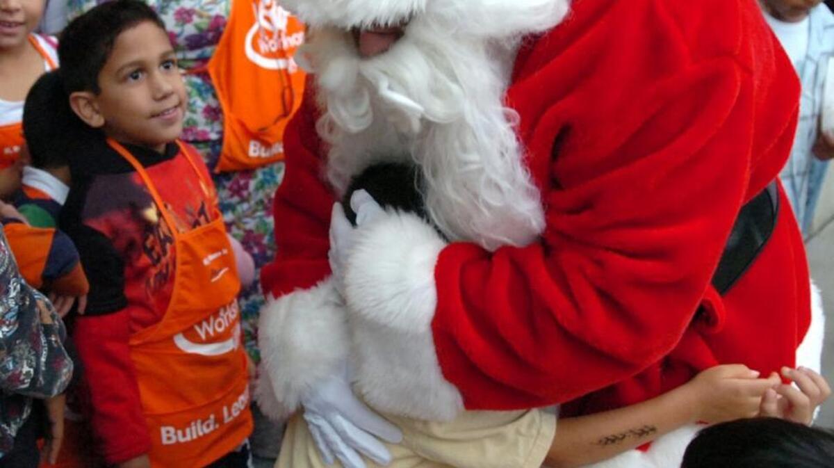 The Girl Scouts of America, which has 16,000 members in the Charlotte area, is advising parents not to force their daughters to hug relatives during the holidays, prompting a fierce debate on social media.